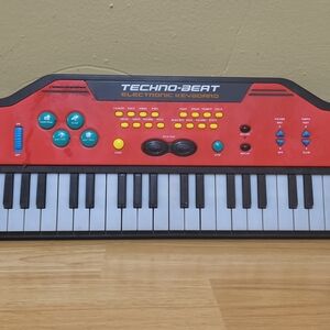 Red Kids Electronic Keyboard - Beginner Learning Toy